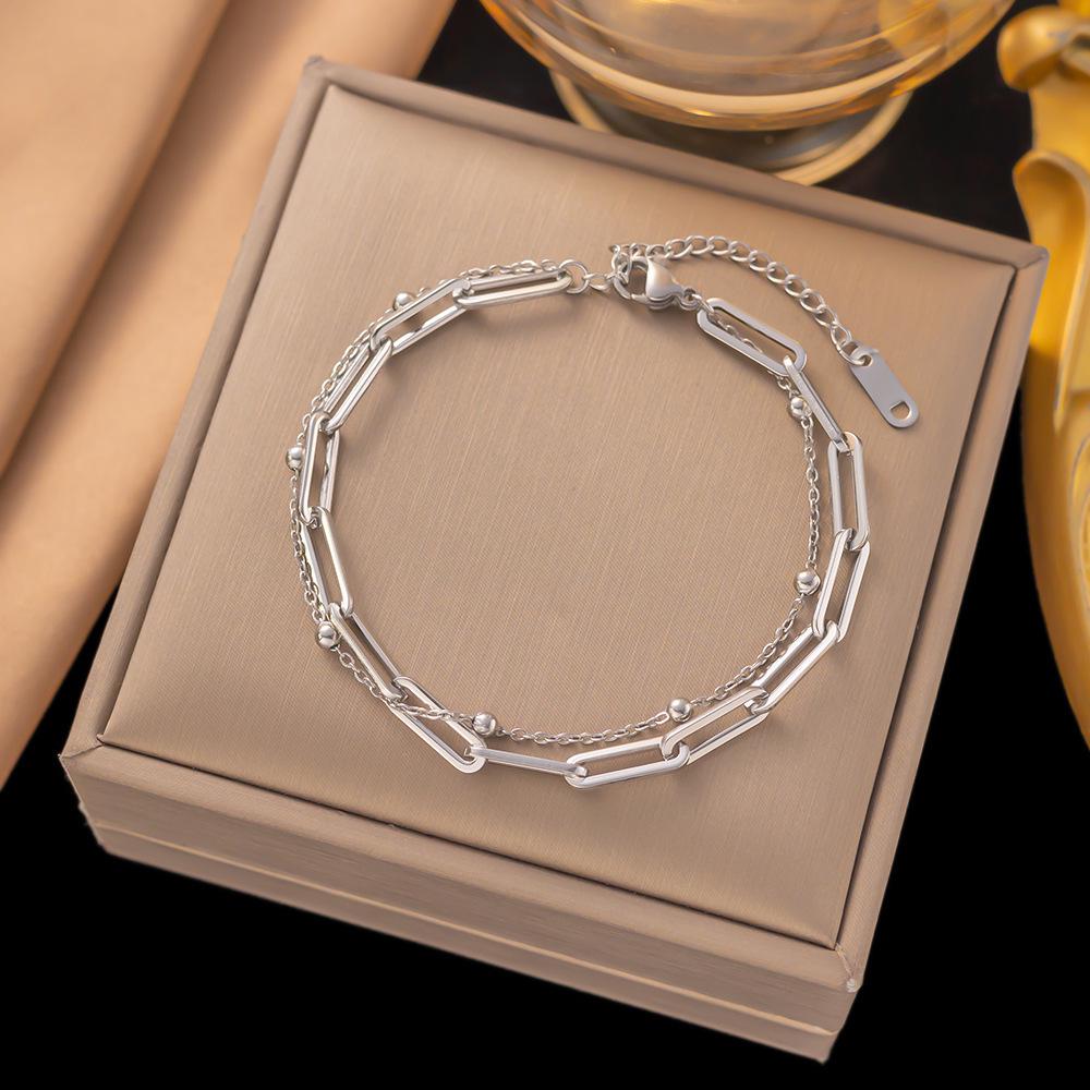 Preferred Bracelet 2: Qi Yun Fashionable Stainless Steel Cross Bracelet - Trendy, Statement, Light Luxury Jewelry.