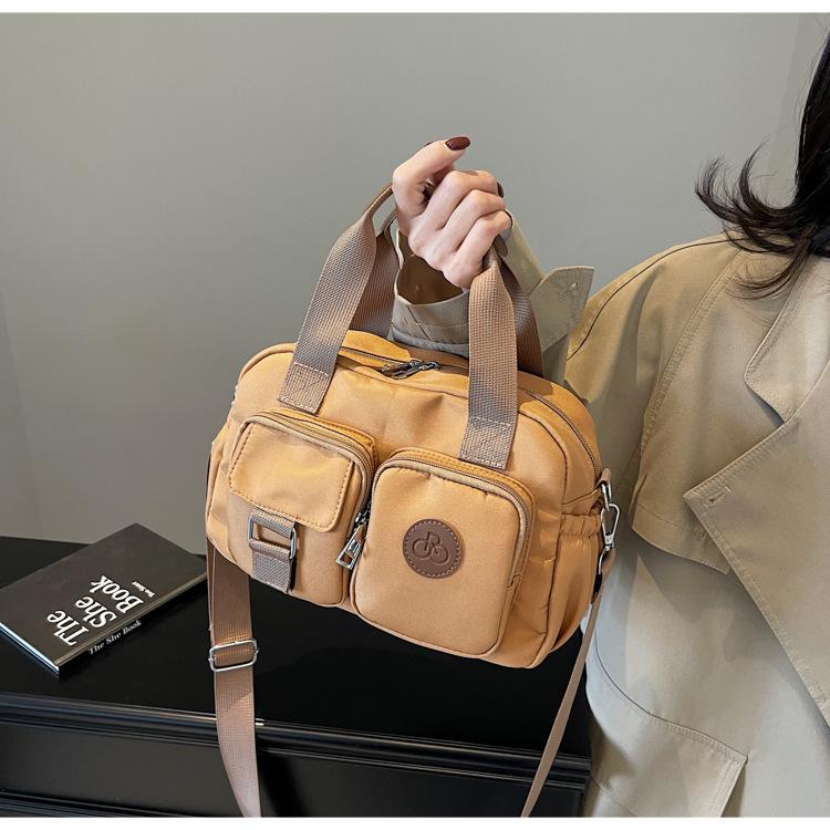 Multi-pocket retro casual handbag 2025 new nylon bag simple shoulder messenger bag