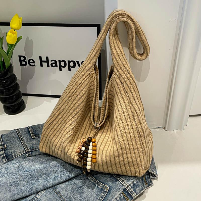

Commuter shoulder bag large-capacity striped tote bag 2025 summer new literary and artistic style solid color trend foreign style women s bag no pendant хакі