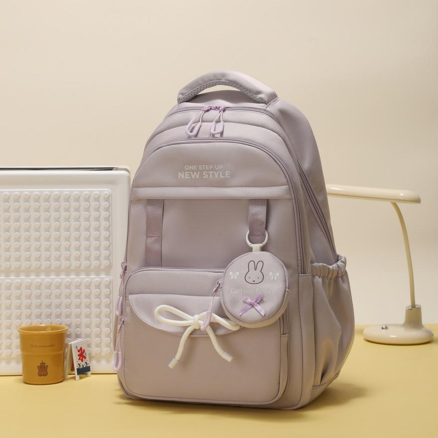 Zaino zaino scolastico giapponese stile college femminile grande capacità dolce carino zaino puro studenti medie e superiori zaino multi-scomparto
