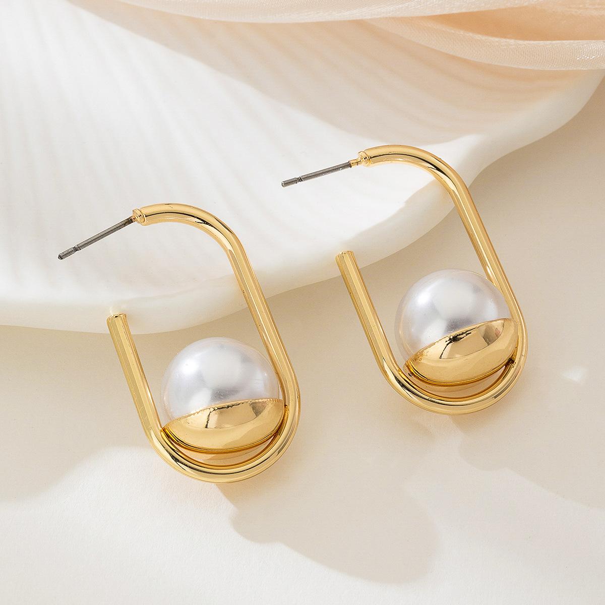 

And Elegant Pearl Hoop Earrings With A Fashionable One Size