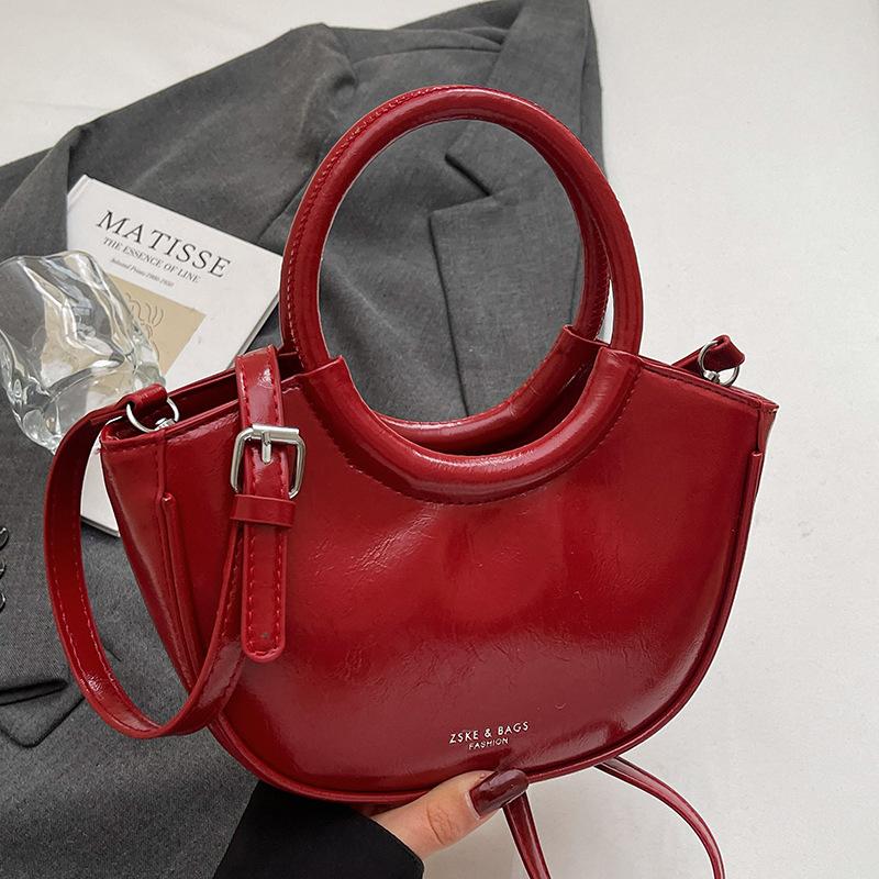 2025 fashion new design casual oil wax leather portable bucket bag simple and versatile solid color temperament messenger women's bag