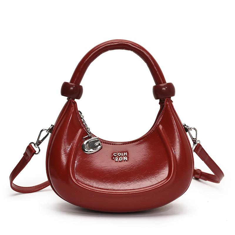 

Premium trend croissant 2025 summer fashion crescent bag women s portable small bag shoulder messenger bag червоний