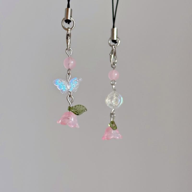 Ręcznie robiony łańcuszek do telefonu z koralików kwiat i motyl zawieszka do telefonu komórkowego kolorowy brelok wisiorek dodatek do telefonu komórkowego