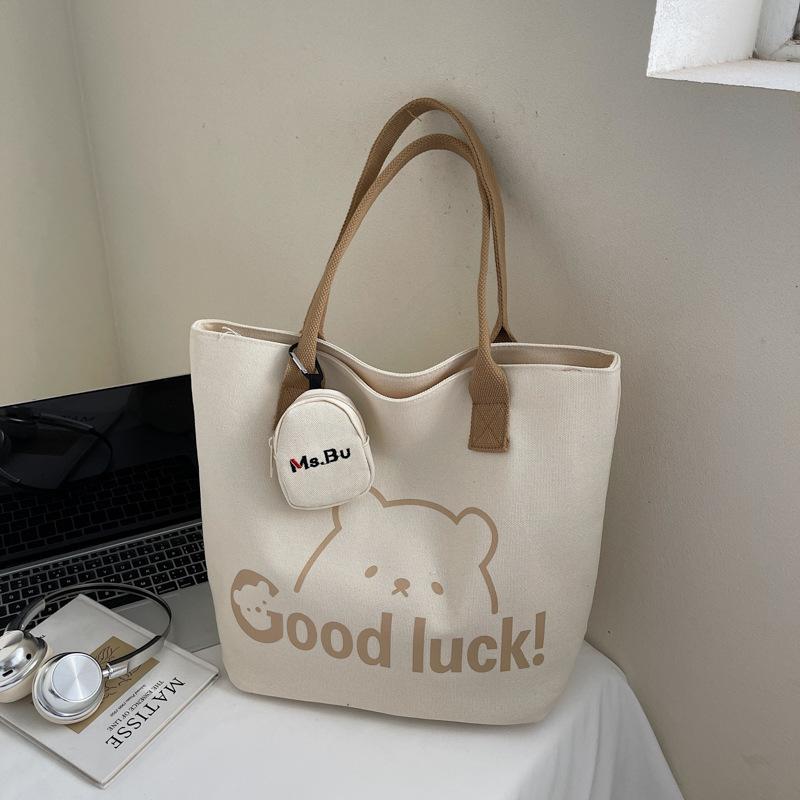 Japanese canvas bag women's shoulder bag 2025 summer new literary style large-capacity simple portable printed canvas bag