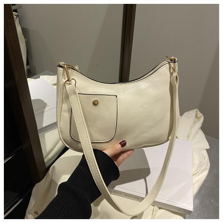 Retro tekstura jednolity kolor duża pojemność wczesna wiosna nowy prosta tekstura modny ukośny span pod pachą torba na ramię