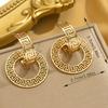 Women's Elegant Vintage C-Shaped Hollow Round Pendant Earrings - Suitable for Casual Outfits and Music Festivals