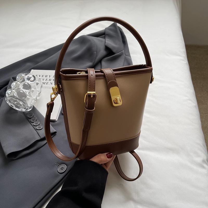 

Internet celebrity contrasting color texture bucket bag messenger bag new popular high sense foreign versatile portable bucket bag хаки
