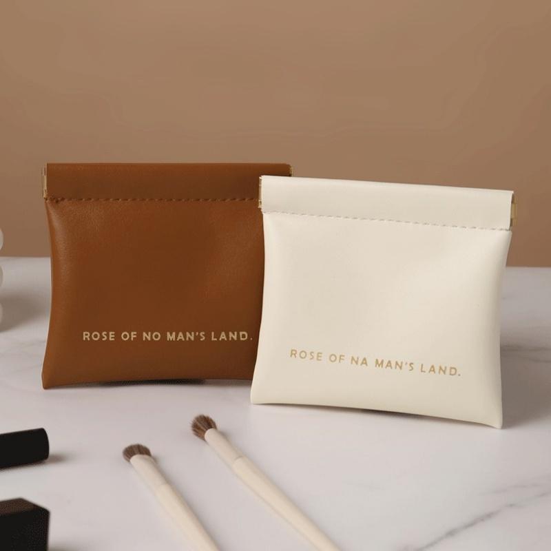 Automatisk stängande förvaringsväska Läppstiftspåse PU-läder Kabelorganisatörsväska Försegling Mynt Nycklar Smycken Förvaringsorganisatörsväska för hörlurar Mini Bärbar