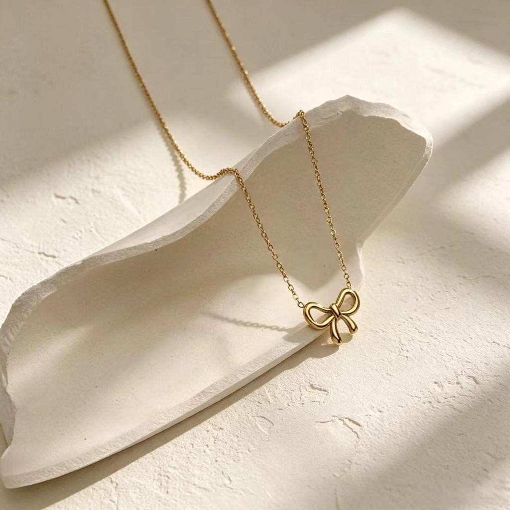 Elegant Double Happiness Knot Bow Pendant Necklace for Women - Versatile High-End Fashion Jewelry