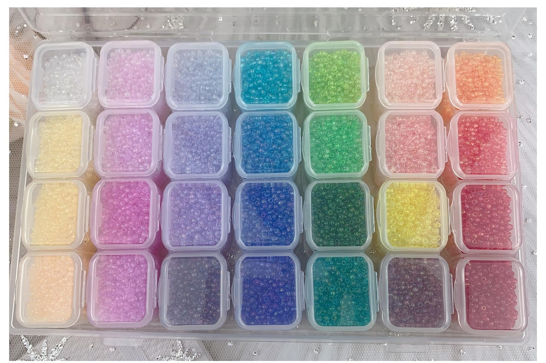 

28-Color Set of 2mm Glass Beads, Mixed Colors, for DIY Crafts, Jewelry Making, and Crafts.