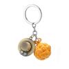 Set of 2 One Piece Devil Fruit Keychains: Law's Ope Ope Fruit & Ace's Mera Mera Fruit