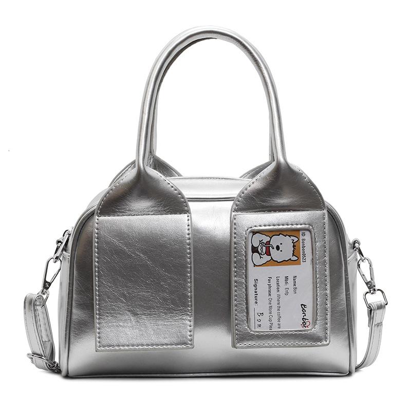 

Стильная и простая портативная сумка-тоут, популярная женская сумка через плечо в этом году, однотонная маленькая свежая сумка-мессенджер из мягкой кожи серебряный