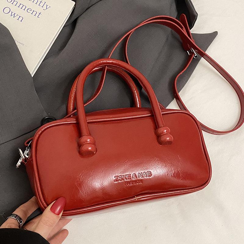 Korean Version of Fashionable Simple Retro Solid Color Portable Boston Bag Casual Versatile Solid Color Commuting Foreign Style Messenger Women's Bag