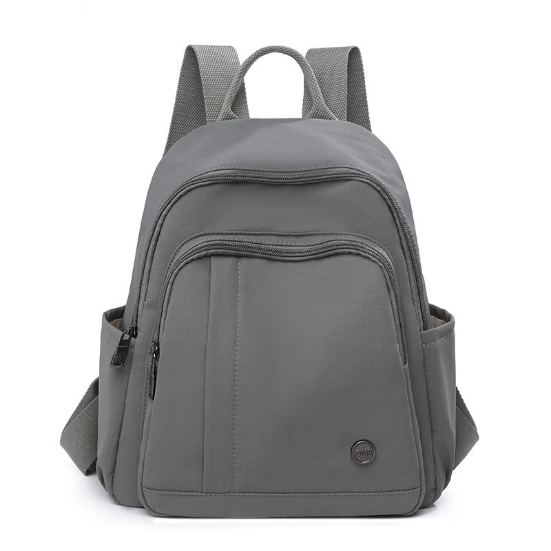 

Легкий нейлоновый рюкзак Женский Большой вместимости Однотонный рюкзак Студенческий школьный рюкзак серый