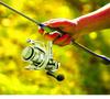 All-Metal Spinning Reel with Slanted Line Cup for Long-Cast Smooth Lure, Sea, and Rock Fishing.