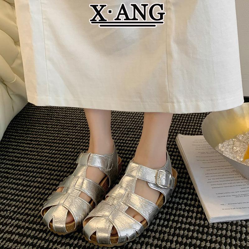 

Leather woven bag head sandals women s 2025 new summer thick-soled pig cage shoes hollow hole shoes Roman women s shoes 35