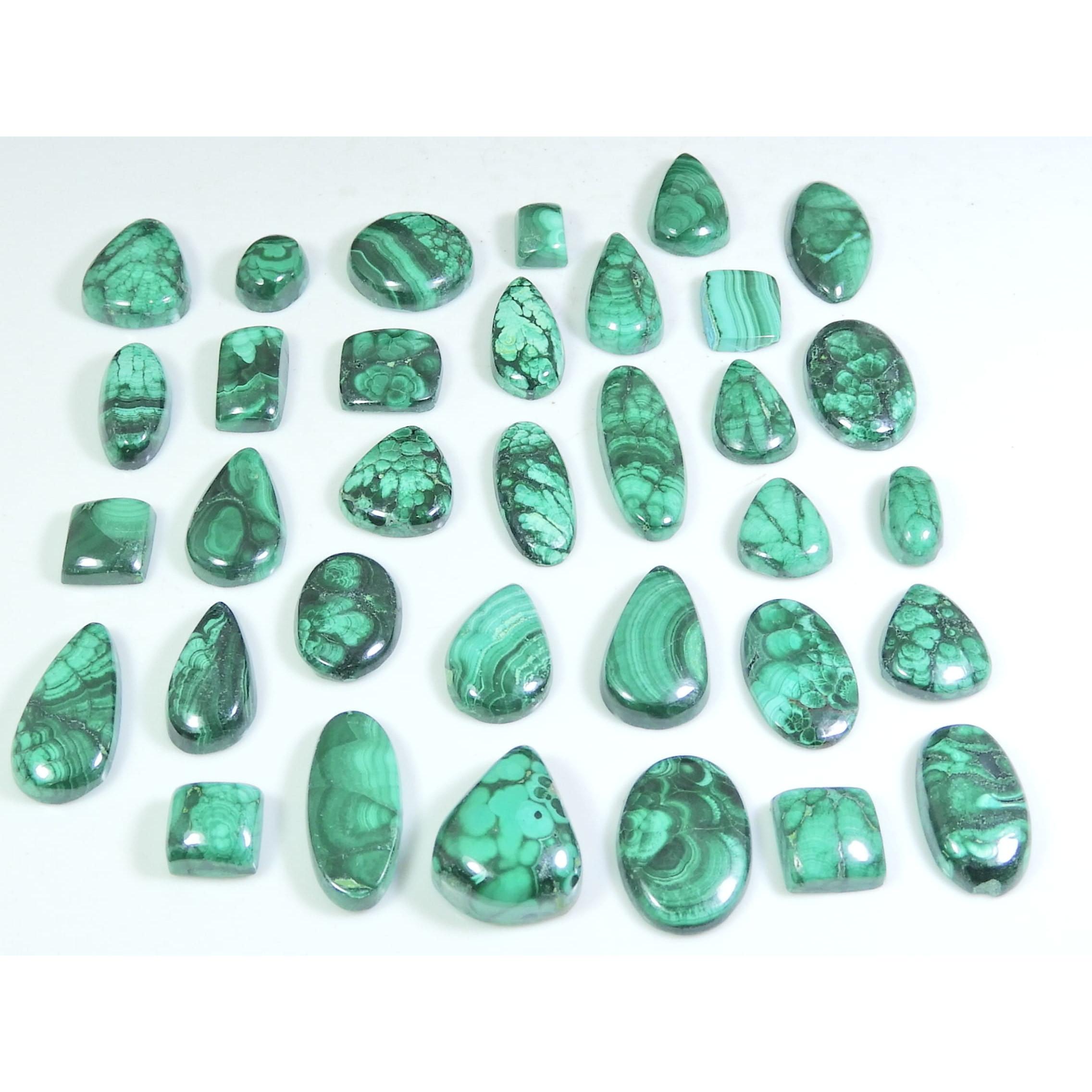 

250 карат. Натуральное зеленое малахитовое кольцо, микс размеров, кабошон, драгоценный камень, лот 34 шт. C-259