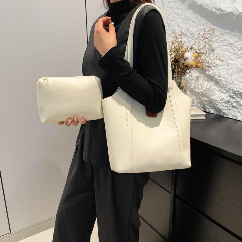 Solid color simple casual handbag women's new temperament versatile tote bag fashionable and popular single shoulder mother and child bag