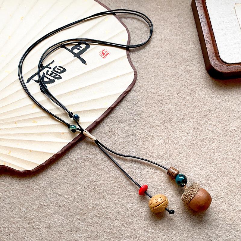 Autumn and winter retro pine nut woven necklace women's retro ethnic style fashion long sweater chain design sense