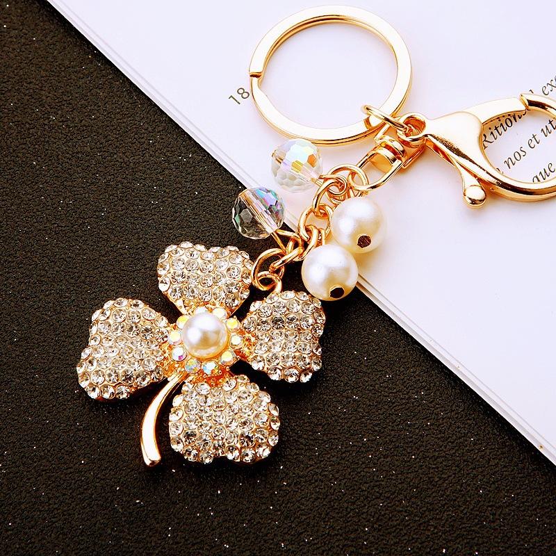 Diamond-encrusted pearl four-leaf clover car keychain, metal women's bag, pendant, crystal string, key chain ring