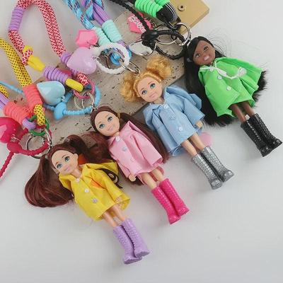 Blogger Raincoat Doll Keychain - Cute Creative Bag Accessory with Wrist Strap for Females