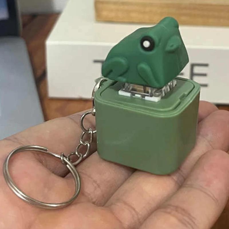 Breloc Jucărie Fidget Broască Oac cu Lumini Colorate, Antistres, Anxietate, Senzorial, Distractiv, Sunet de Animal, Jucărie cu Buton