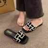 French flat-bottomed cool slippers women's summer outer wear fashion 2025 new Xiaoxiangfeng women's seaside beach sandals