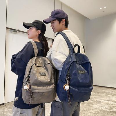 Simple and Versatile Backpack On Campus  High School Students' Large Capacity Leisure  Light Shoulders for Men and Women.