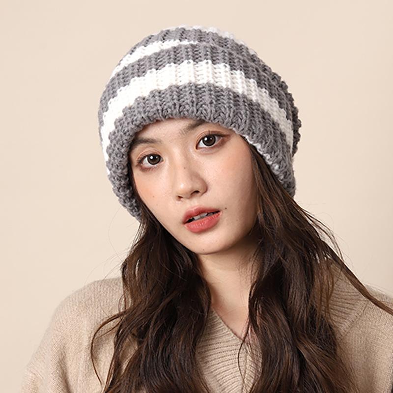 Pile hats autumn and winter lazy wind color matching coarse knitted wool hats women's cold hats men's big head circumference showing small face
