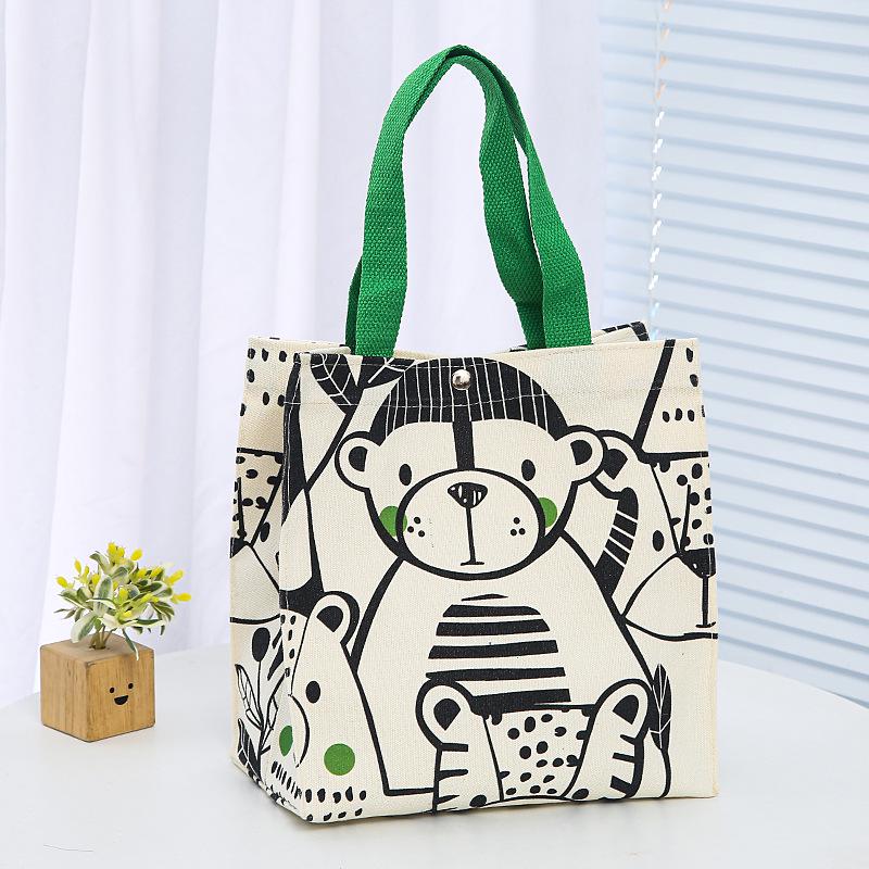 

Літня жіноча сумка з мультяшним полотном 2023 року: Маленький, простий та ідеальний як сумка для обіду або студента.