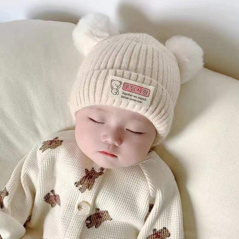 Baby autumn and winter cute cartoon warm hairball wool hat boys and girls baby ear protection hat children pullover knitted hat
