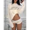 T-shirt a maniche lunghe stile vintage USA, Top dolce minimalista, Camicia casual elegante da donna