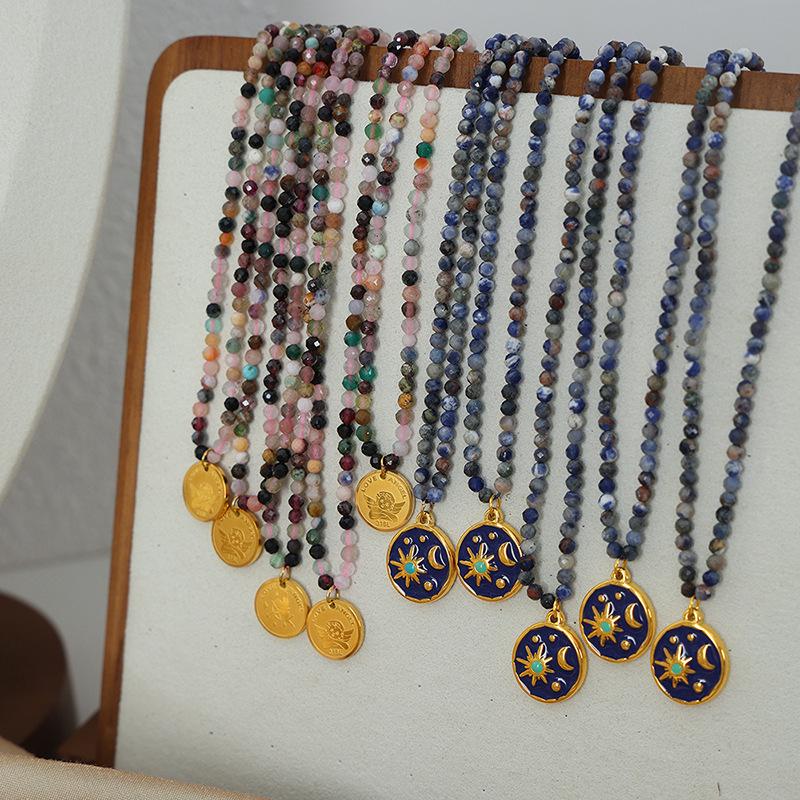 European-American Niche: Blue Spirit Grey Natural Stone Handmade Necklace with Starry Sky Glaze Angel Pendant in Gold-Plated Titanium Steel.