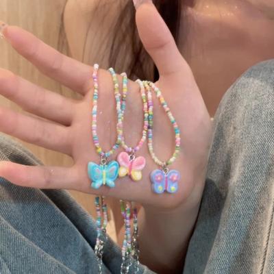 Collier différent fille couleur papillon perlé femme doux enfants été mignon dessin animé chaîne clavicule tendance