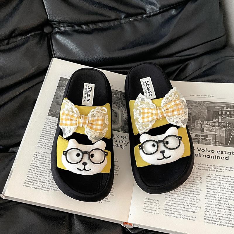 Fashion versatile cute cat cat thick bottom one-word drag female summer bow girl wear flat bottom slippers cool slippers