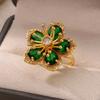 Grüne Zirkonblumenringe für Damen Goldfarbe Edelstahl Blume Floraler Ring Eleganter Luxus Hochzeit Ästhetischer Schmuck Geschenk