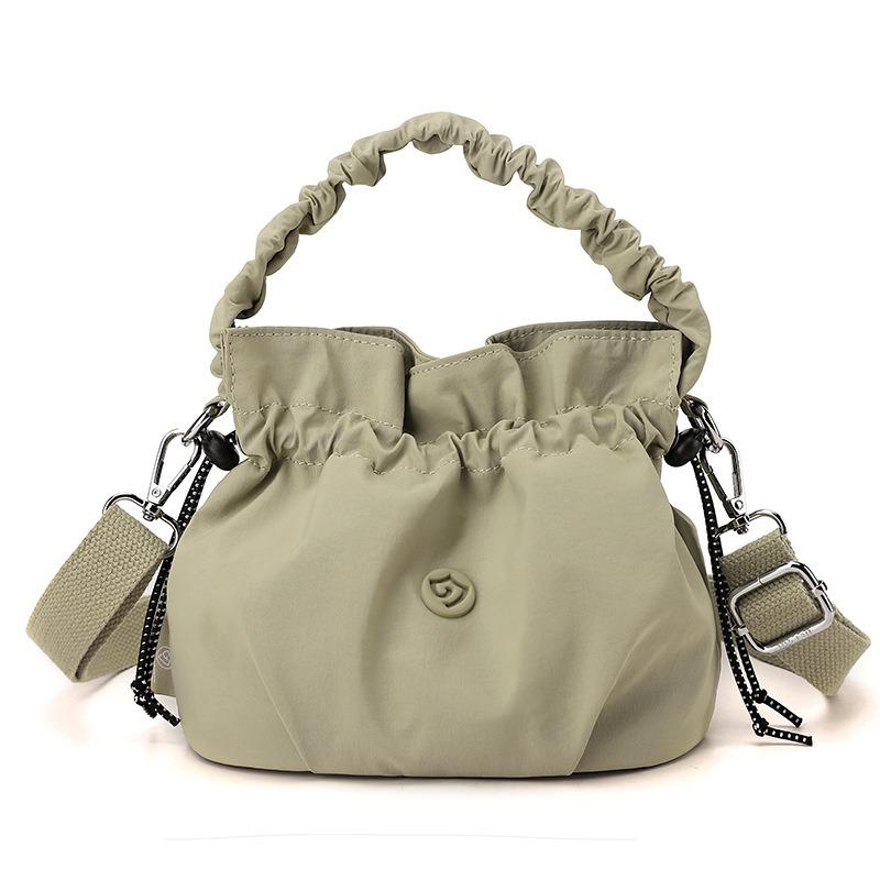 

Macron drawstring bucket bag summer new simple versatile handbag women s shoulder messenger bag