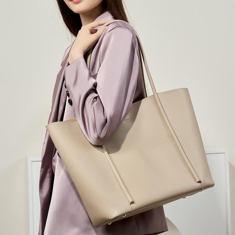 2025 Neue Damen Handtasche aus echtem Leder Rindsleder Pendler Umhängetasche Große Kapazität Handtasche Tragetasche