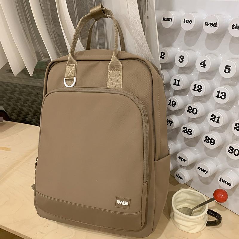 Handbag for primary school students, girls, junior high school students, new solid color backpack