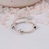 Adjustable Silver Fidget Ring: Minimalist anxiety jewelry with three movable spinner beads and a simple open wrap design.