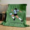 Illustration of a soccer player wearing stripes chasing a ball on a green field. for all seasons blanket lunch break throw gift