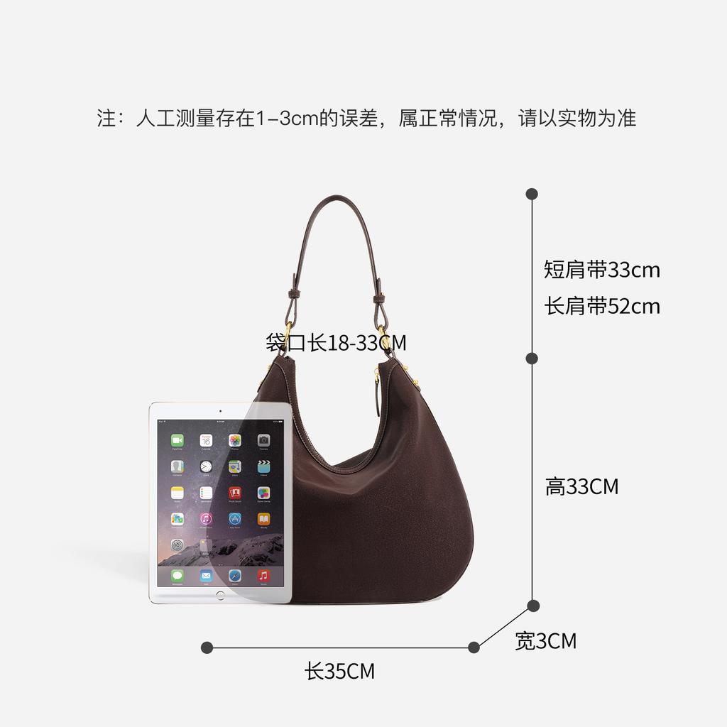 Niche design new retro texture cowhide bag underarm hand carry temperament casual lazy wind large capacity dumpling bag