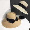 Chapeau de paille Panama de luxe mode été pour femme Chapeau haut à large bord Casquette protection solaire Chapeau polyvalent pour vacances Plage Fascinateur