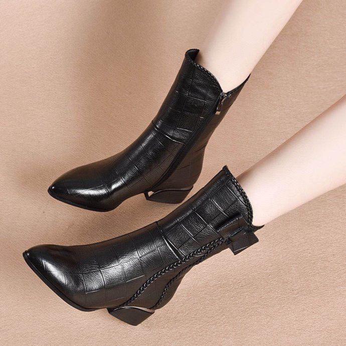 Pointed fashion short boots women's autumn and winter new black bow embossed cowhide side zipper medium boots