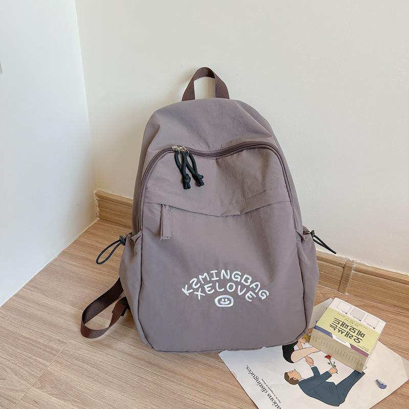School bag Lazy wind school bag Female high school college student Campus letter backpack Junior high school student tide backpack