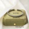 Personalized High-End Titanium Steel Open Cuff Bracelet for Women - Stretchy, Irregular Design, Exquisite Non-Fading Finish
