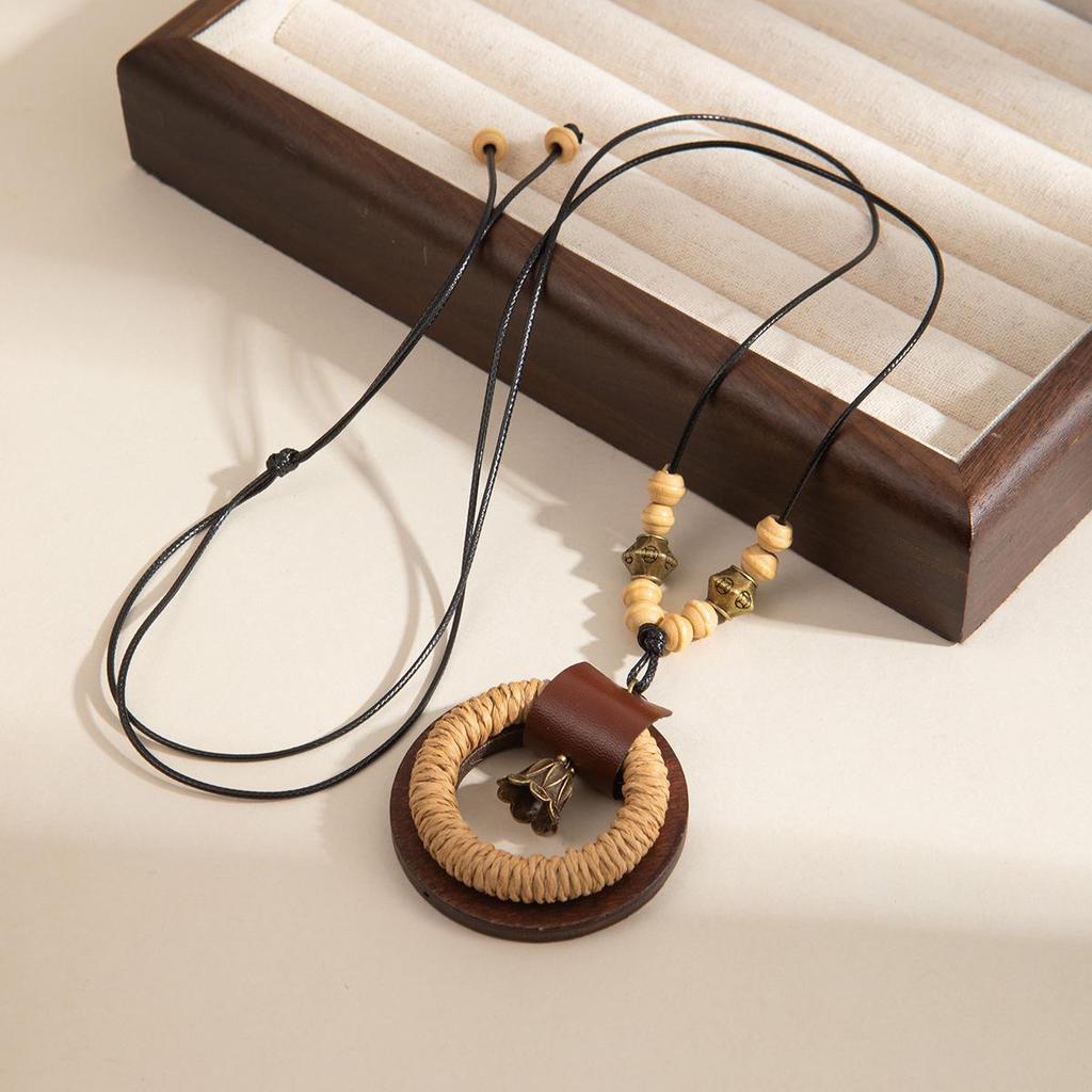 Antique Bronze Feather Necklace: Bohemian Double-Layer Zen Style for Women