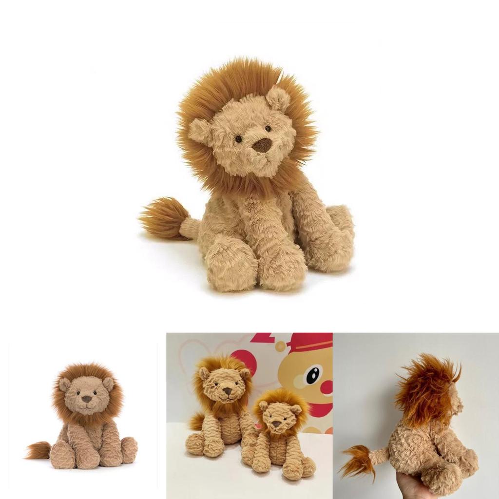 León de peluche con pelaje ondulado, ideal como regalo para niñas y para coleccionistas.