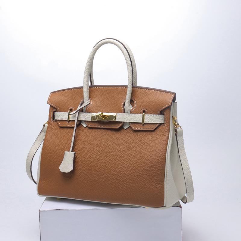 2021 Spring new trendy leather handbag top layer cowhide capacity one-shoulder crossbody hand-carried platinum bag